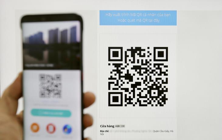 People must register for QR codes when going to Ho Chi Minh City